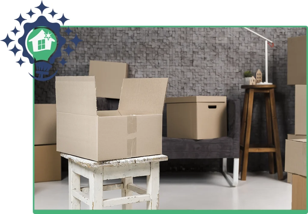 An open cardboard box in a room being packed, symbolizing the clutter and dust that a professional cleaning service can handle.