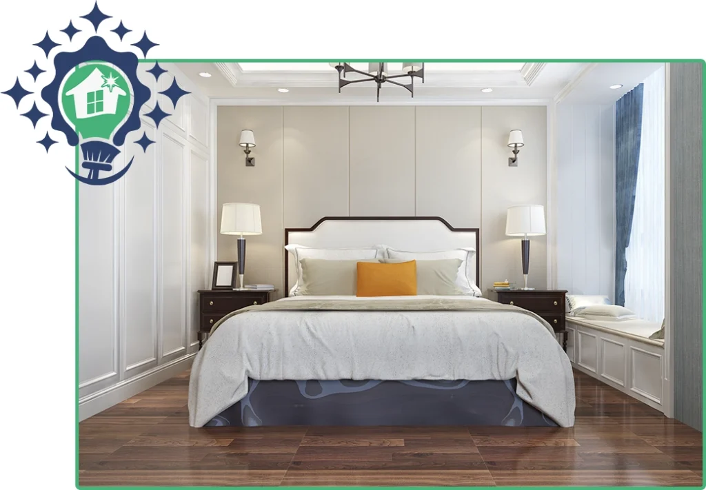 A luxurious and tidy bedroom with a perfectly made bed, elegant furniture, and hardwood floors, set up by a professional moving service.