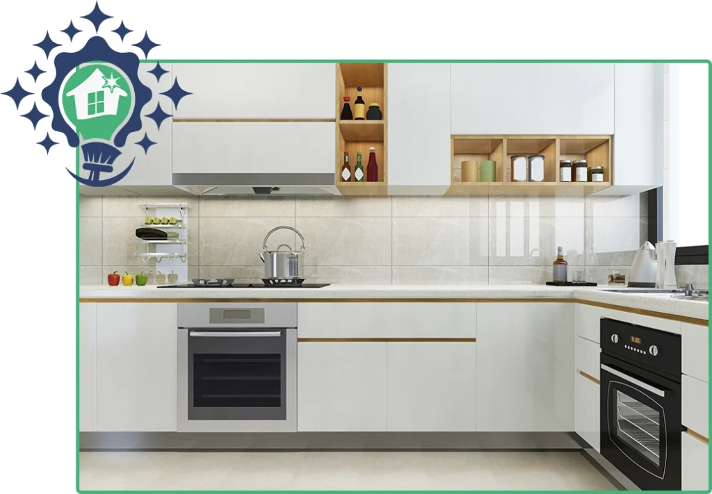 Clean and modern white kitchen with wooden accents, integrated appliances, and organized shelves, ideal for home cleaning services.